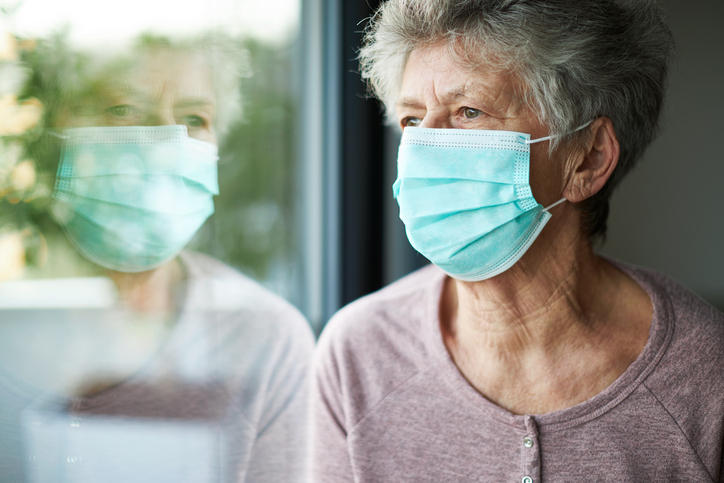 Elderly resident wearing a mask